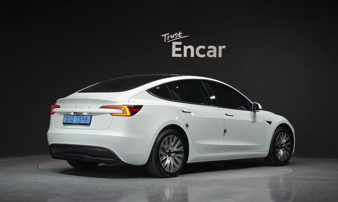Tesla Model 3 — фото 2