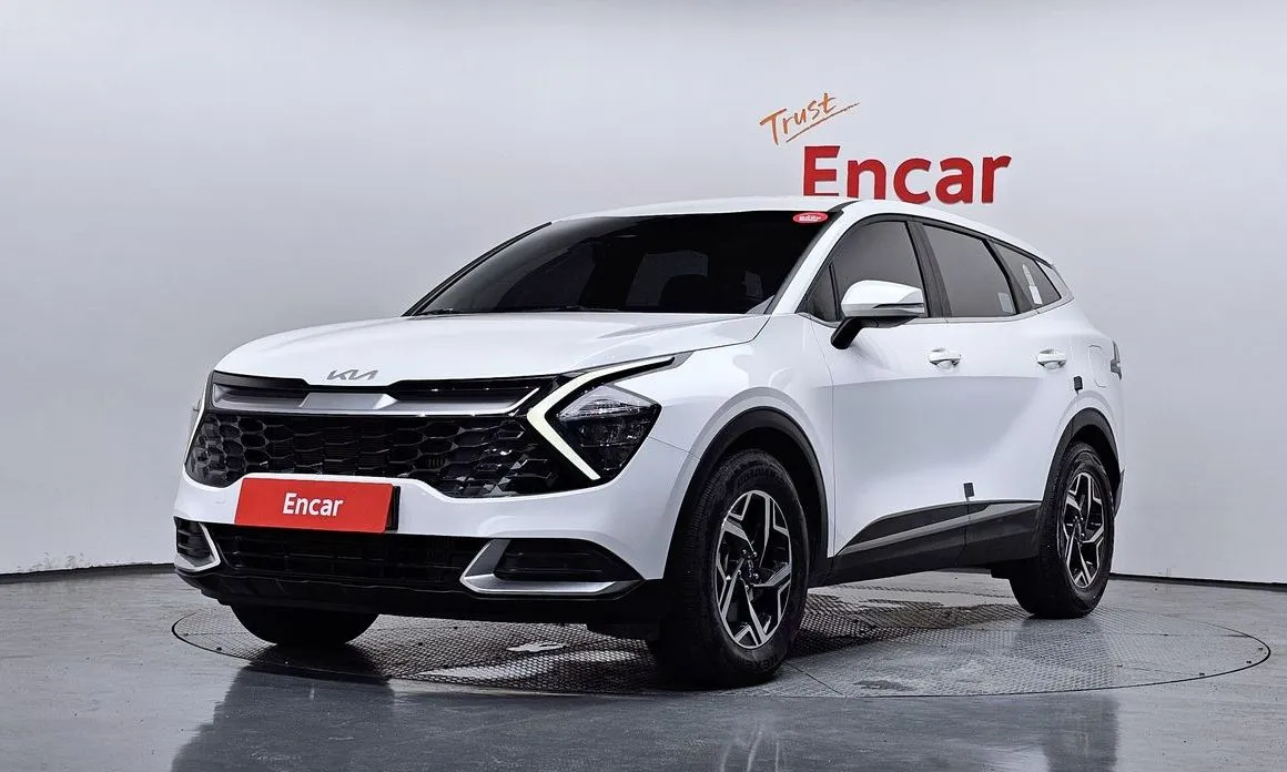 Kia Sportage — фото 1