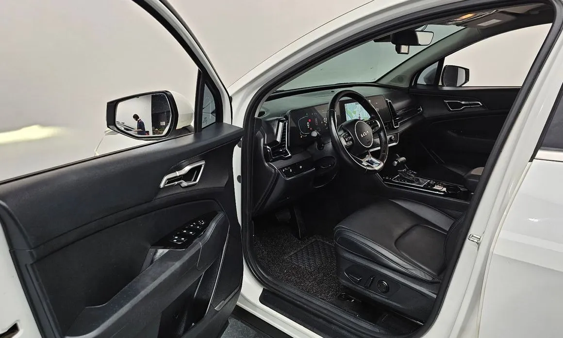 Kia Sportage — фото 7