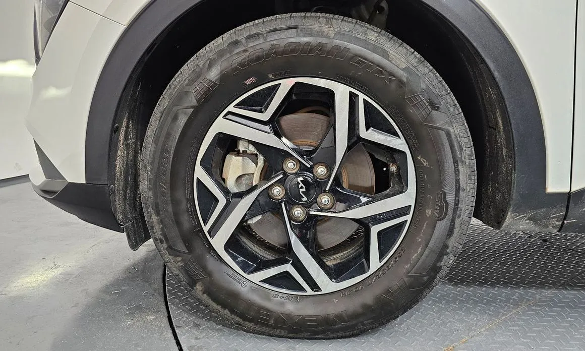 Kia Sportage — фото 10
