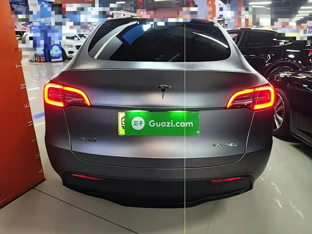 Tesla Model Y — фото 10
