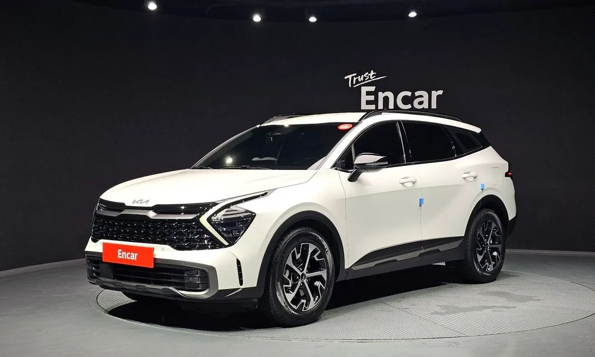 Kia Sportage — фото 1