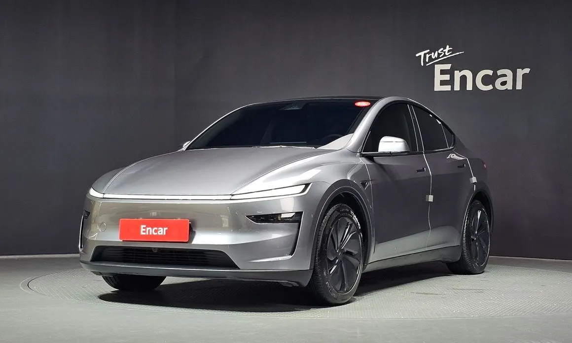 Tesla Model Y — фото 1