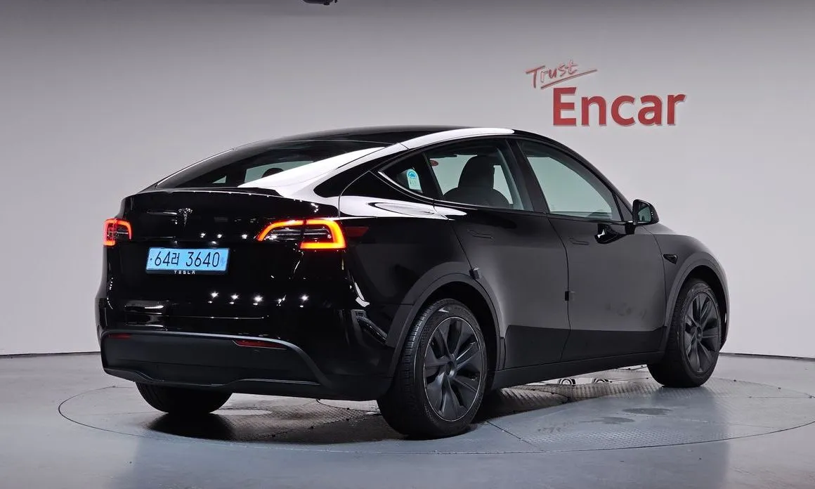 Tesla Model Y — фото 7