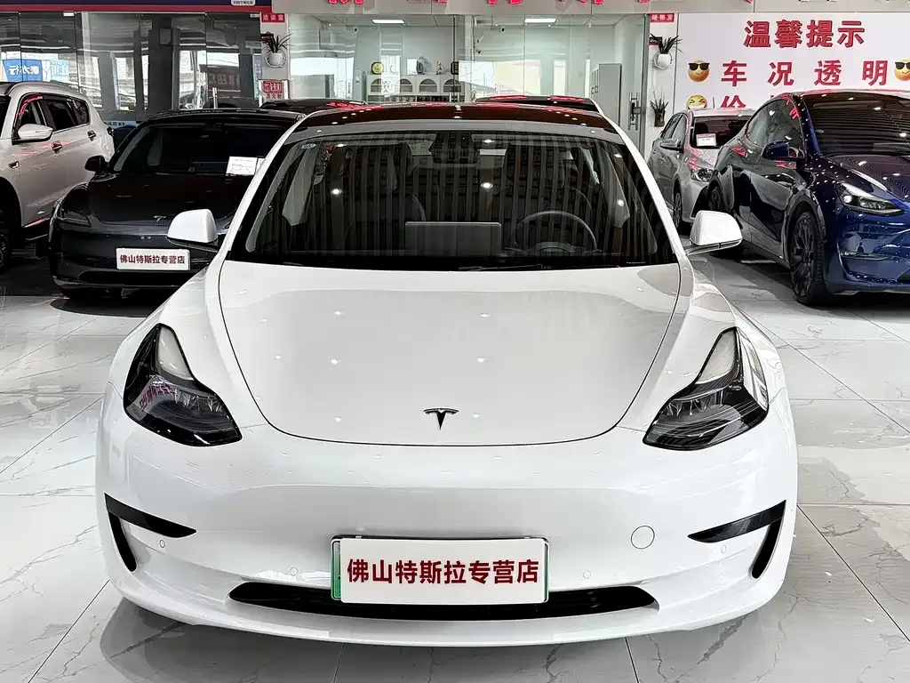 Tesla Model 3 — фото 9