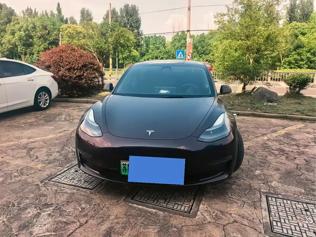 Tesla Model 3 — фото 9