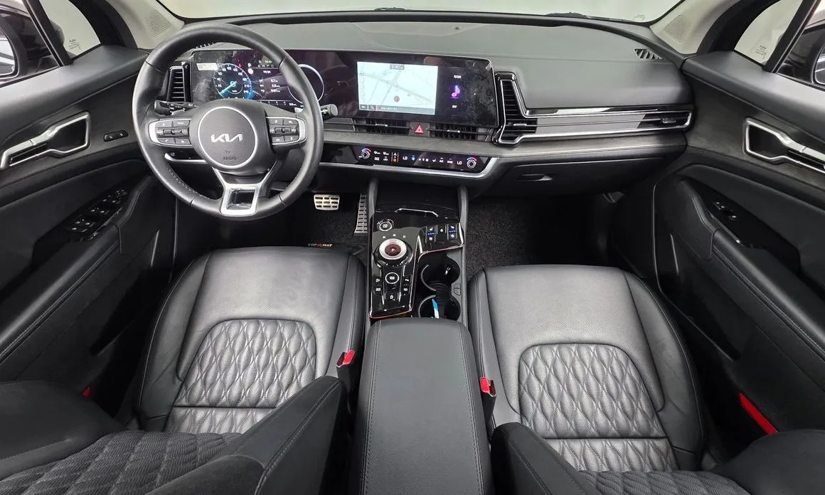 Kia Sportage — фото 9