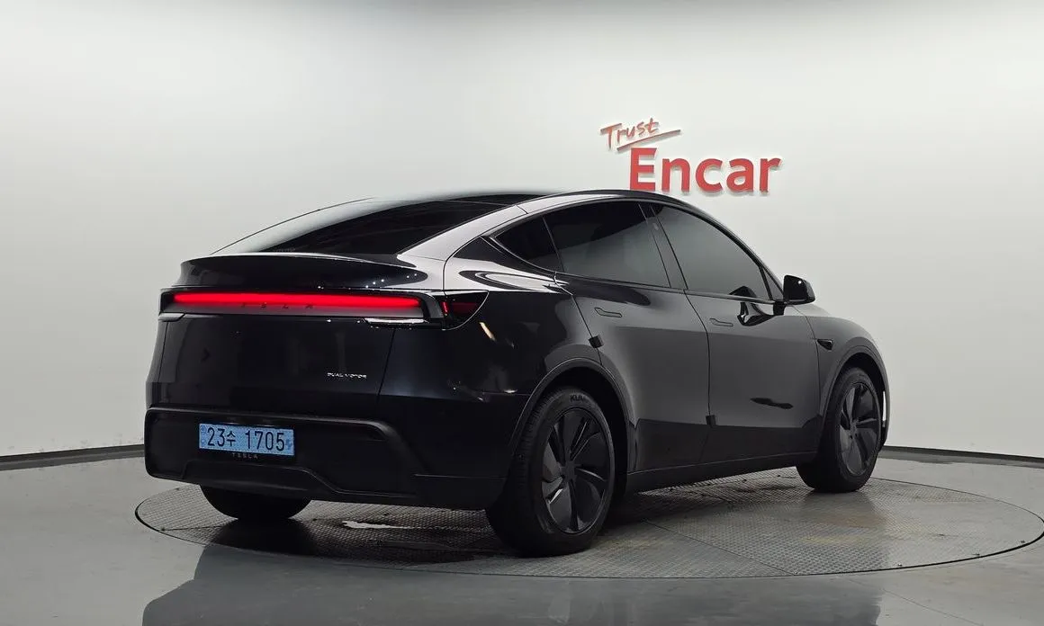 Tesla Model Y — фото 7