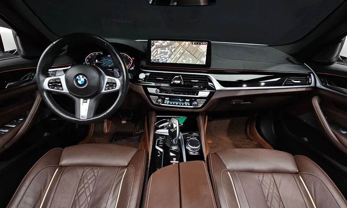 BMW 5-Series — фото 10