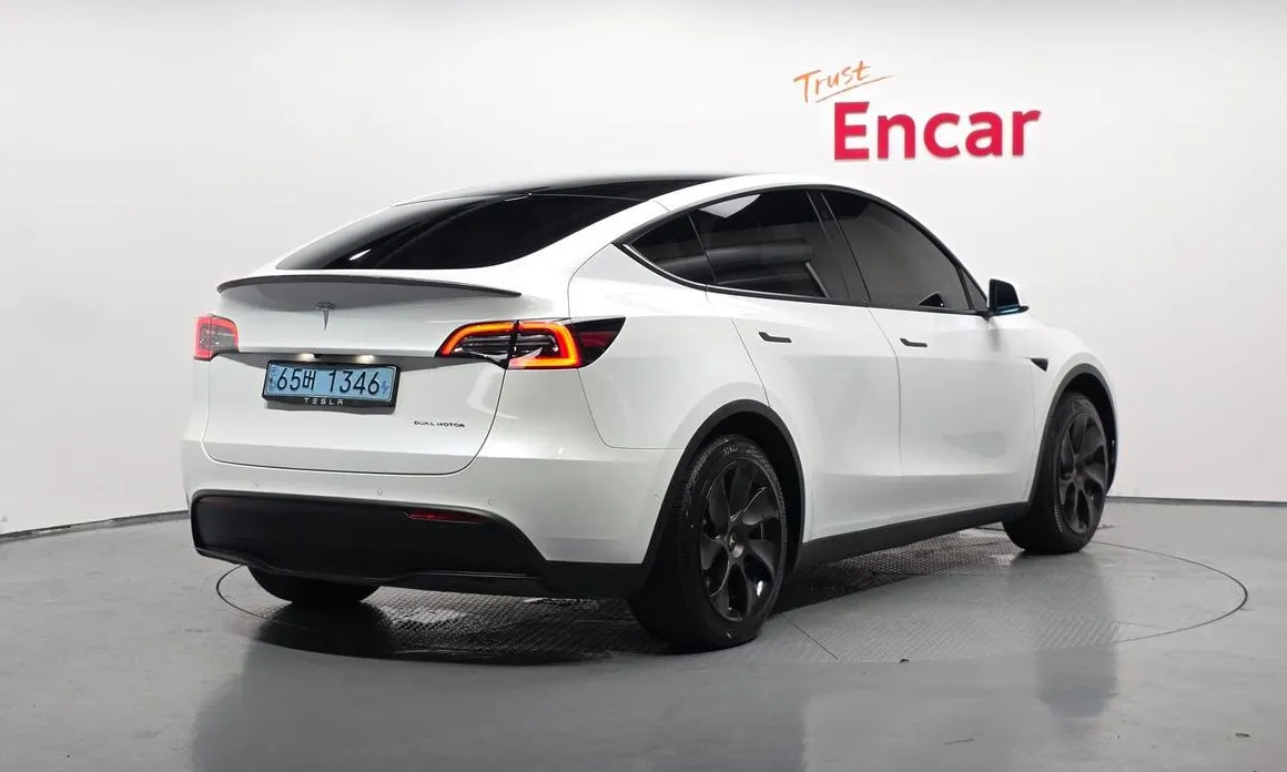 Tesla Model Y — фото 7