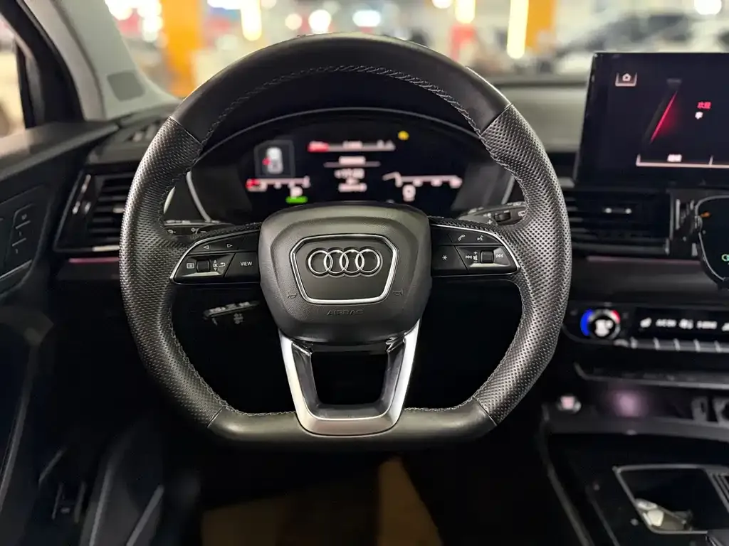 Audi Q5L — фото 7