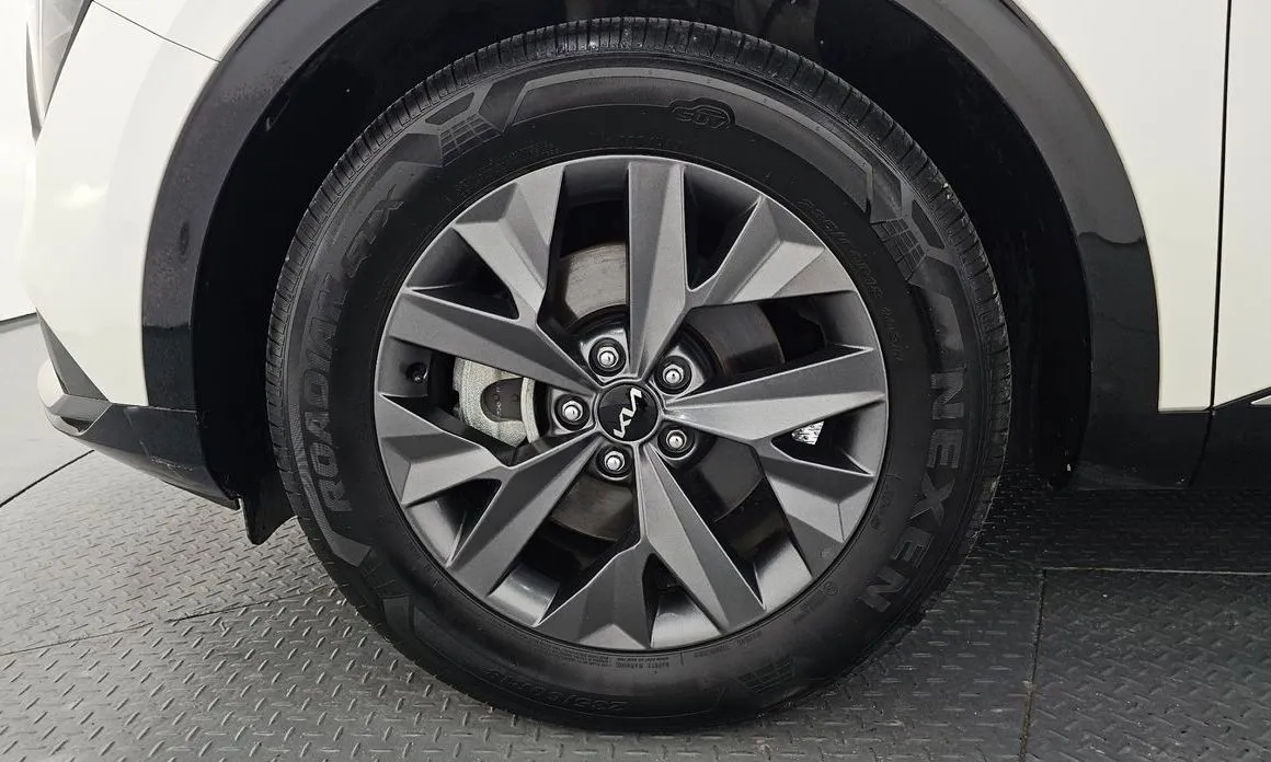 Kia Sportage — фото 8