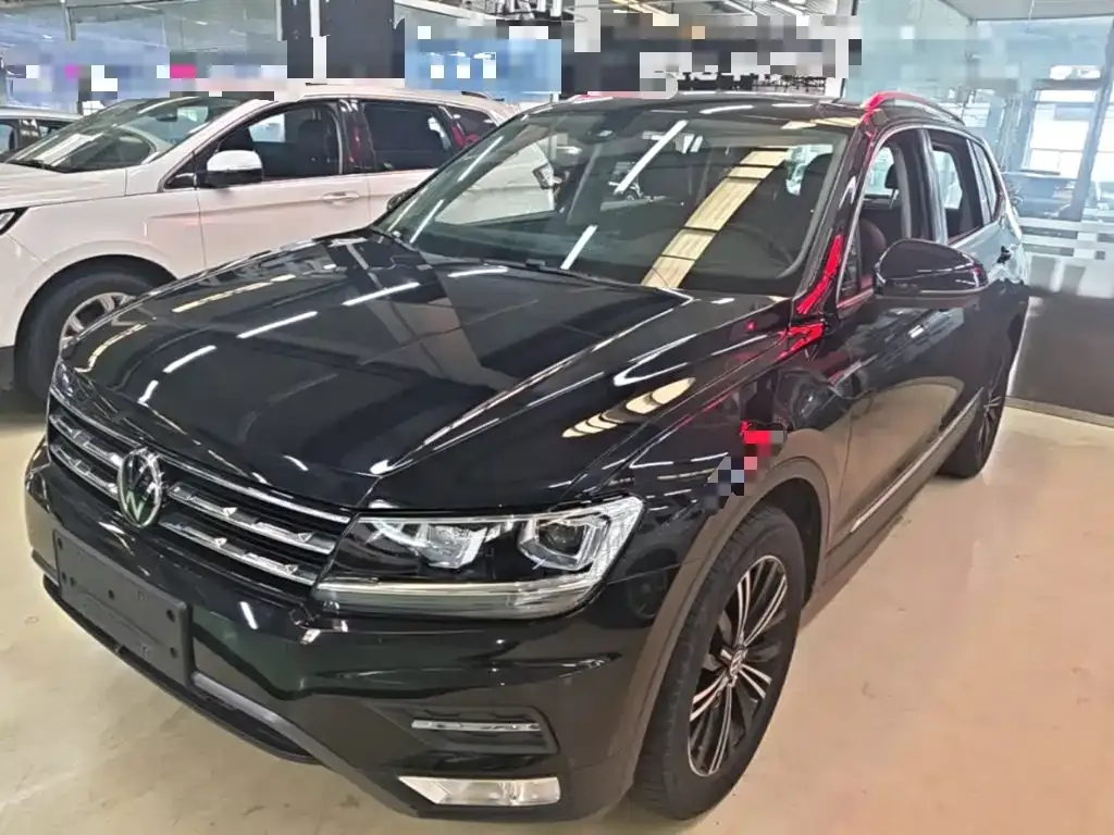 Volkswagen Tiguan L — фото 10