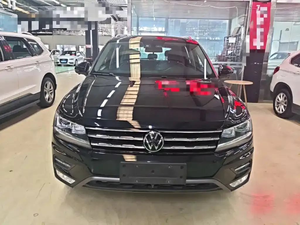 Volkswagen Tiguan L — фото 6