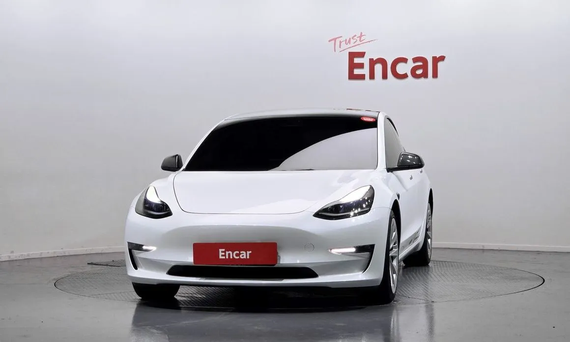 Tesla Model 3 — фото 7
