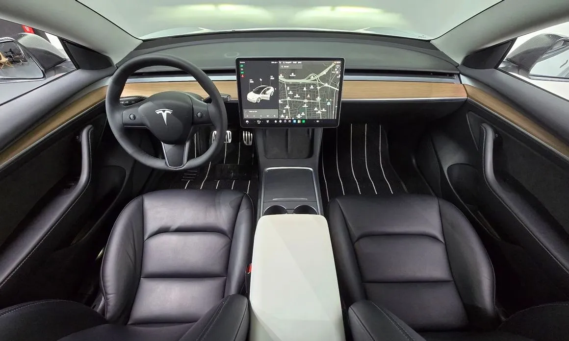 Tesla Model 3 — фото 9
