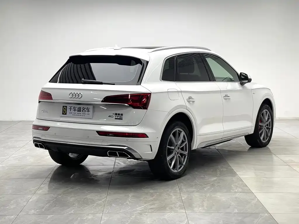 Audi Q5L — фото 7