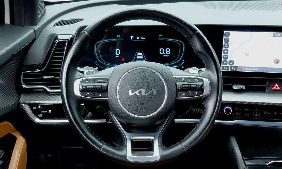 Kia Sportage — фото 7