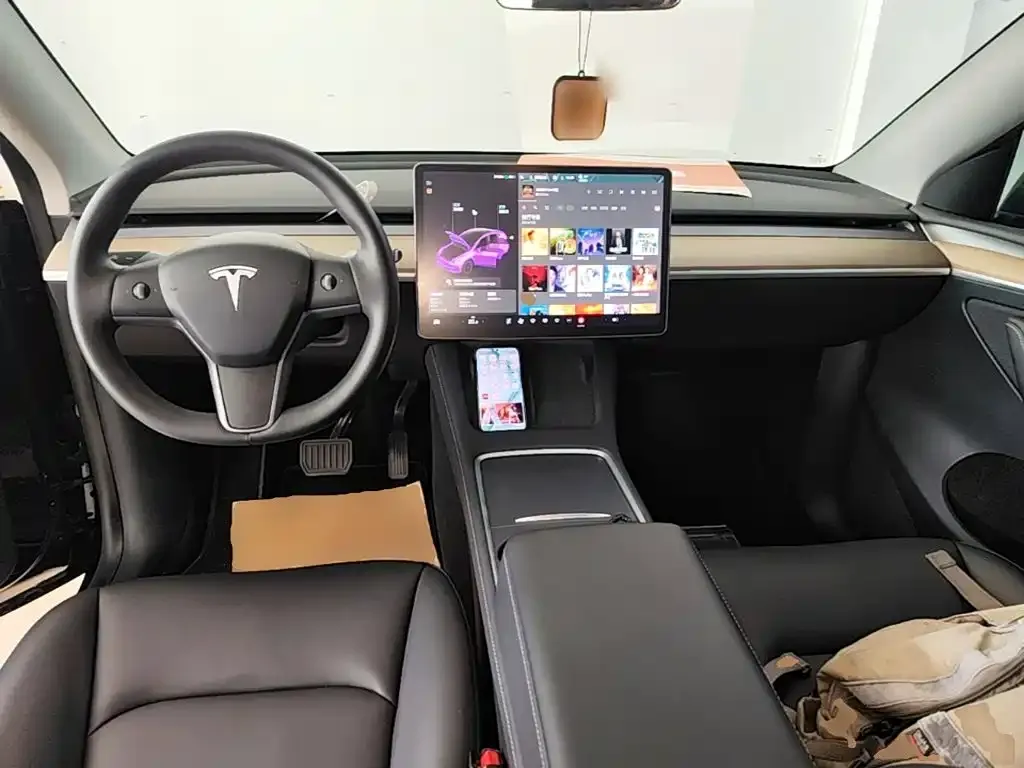 Tesla Model Y — фото 7