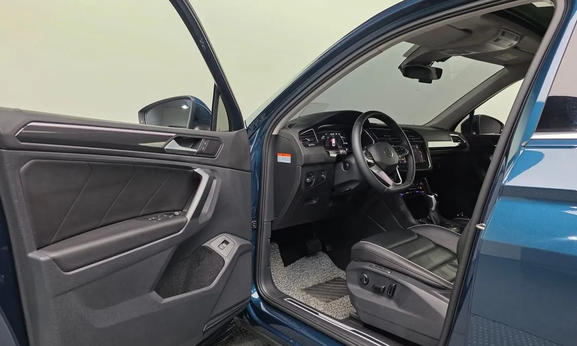 Volkswagen Tiguan — фото 9