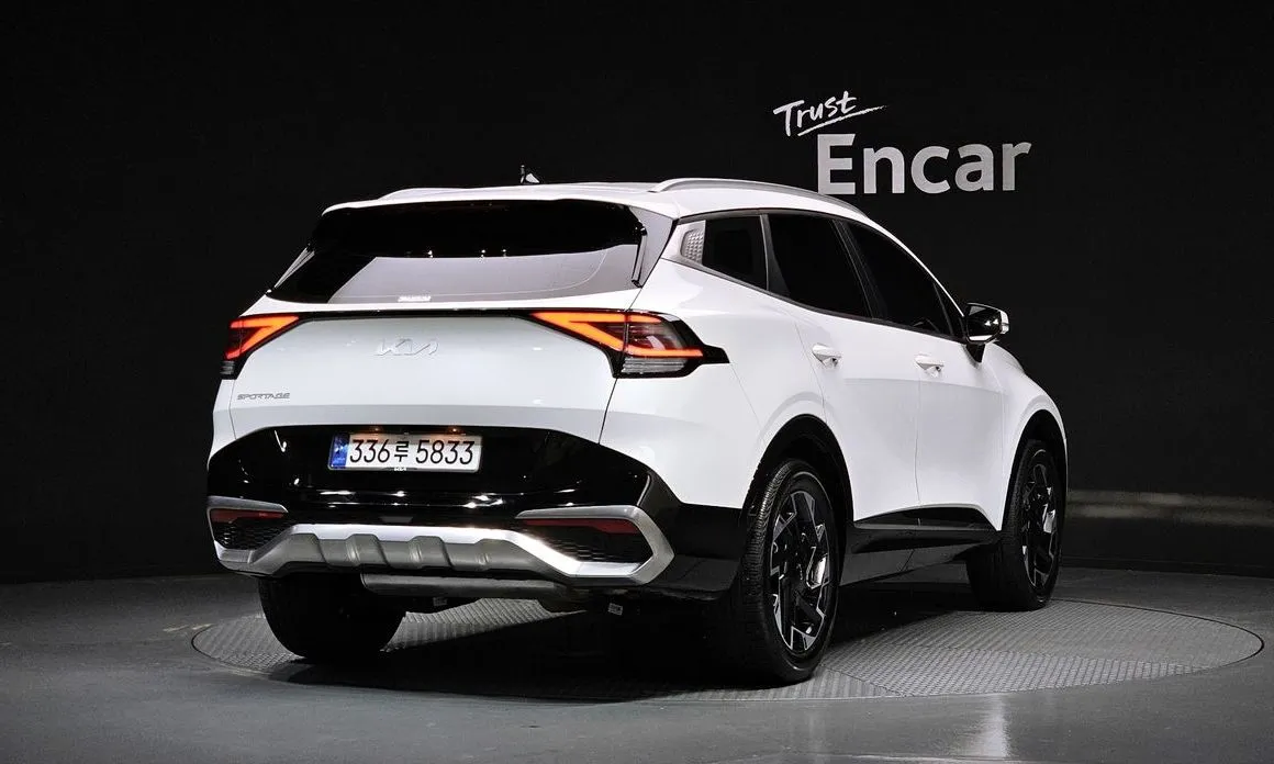 Kia Sportage — фото 8