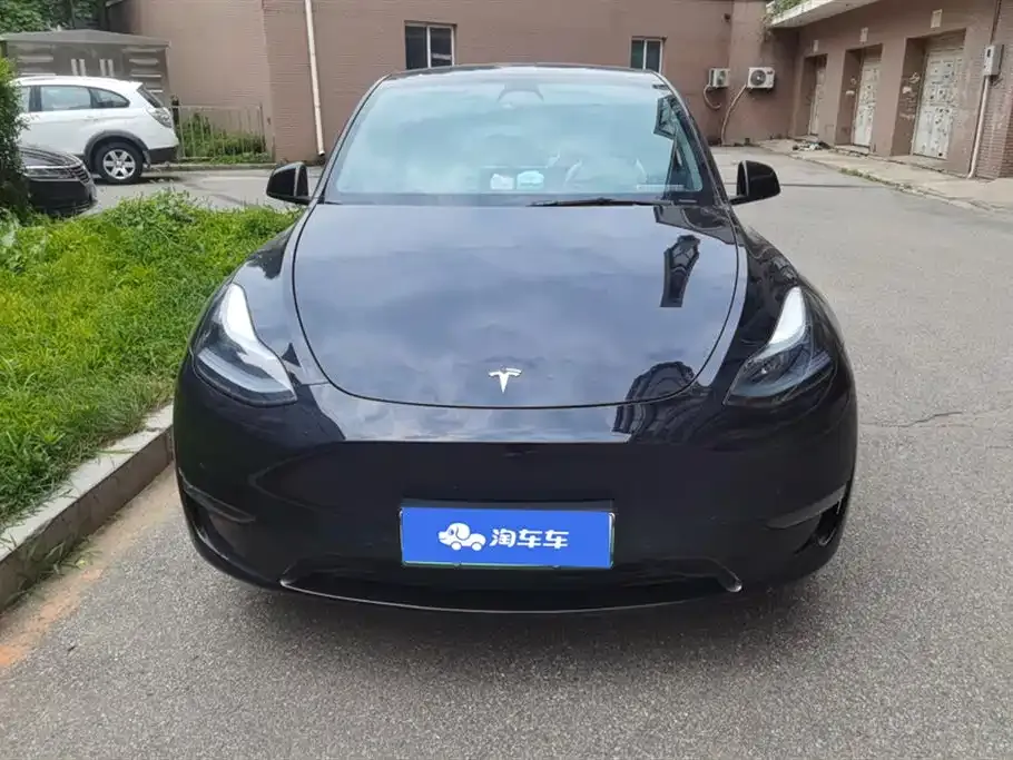 Tesla Model Y — фото 10