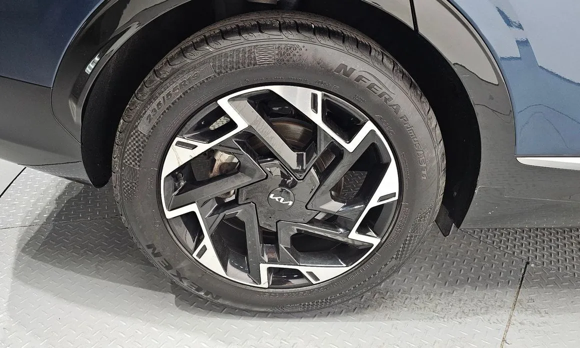 Kia Sportage — фото 9