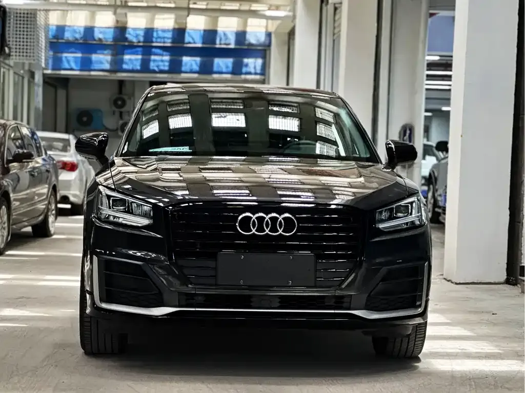Audi Q2L — фото 6