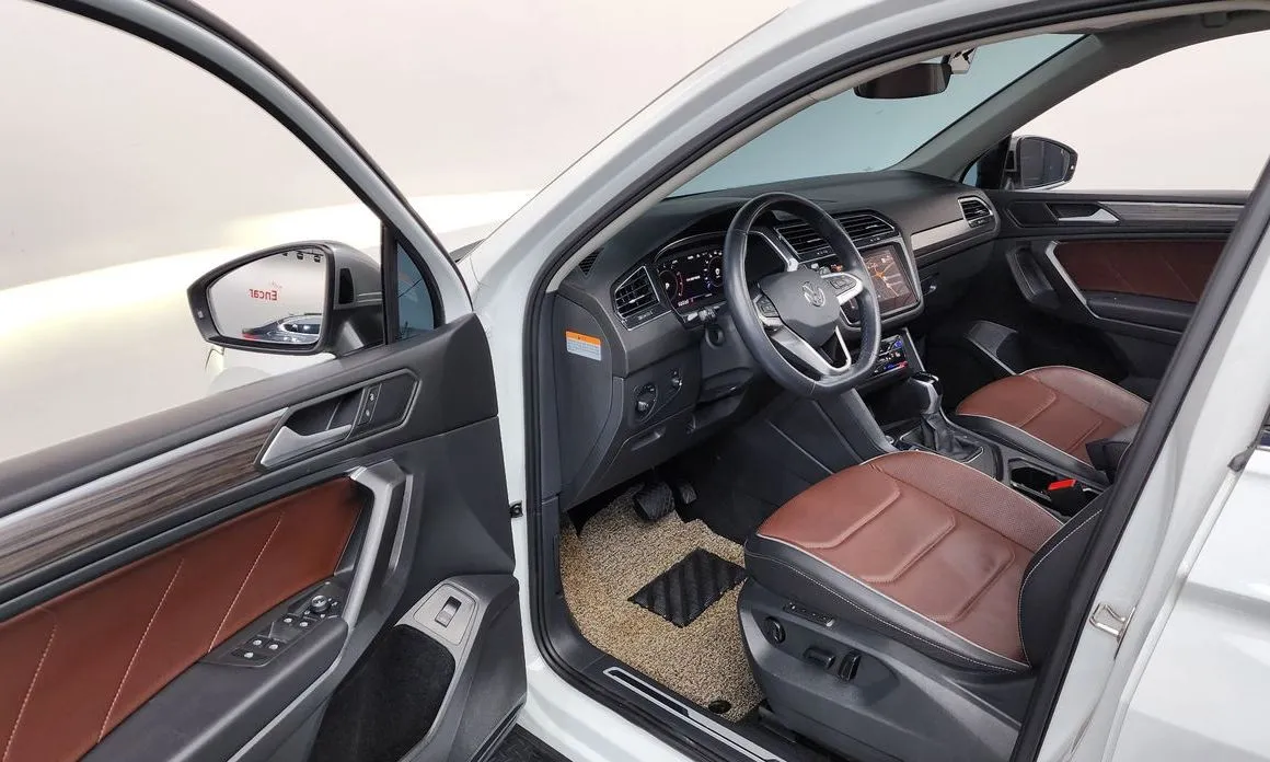 Volkswagen Tiguan — фото 8