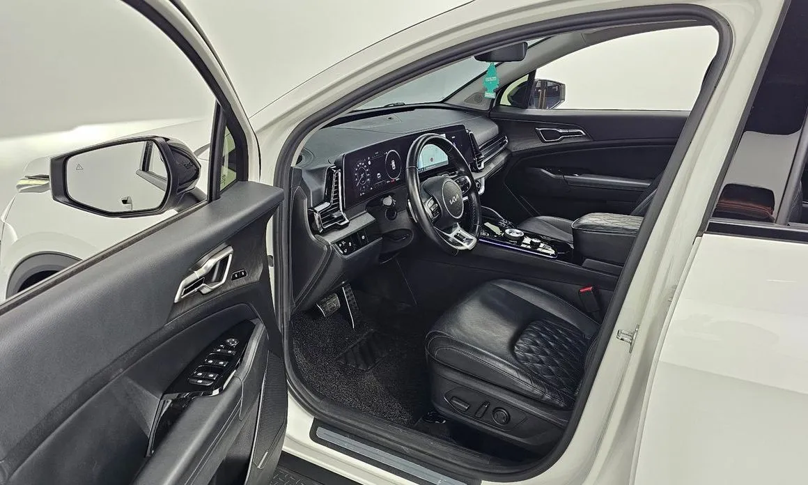 Kia Sportage — фото 10