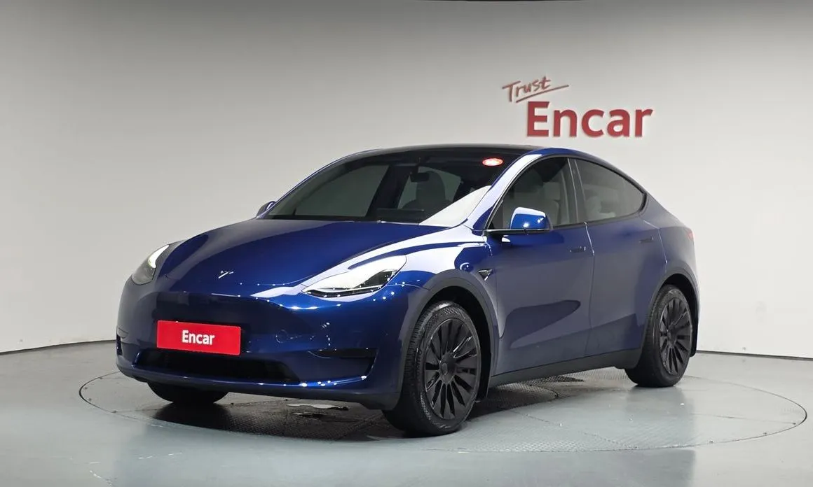 Tesla Model Y — фото 1