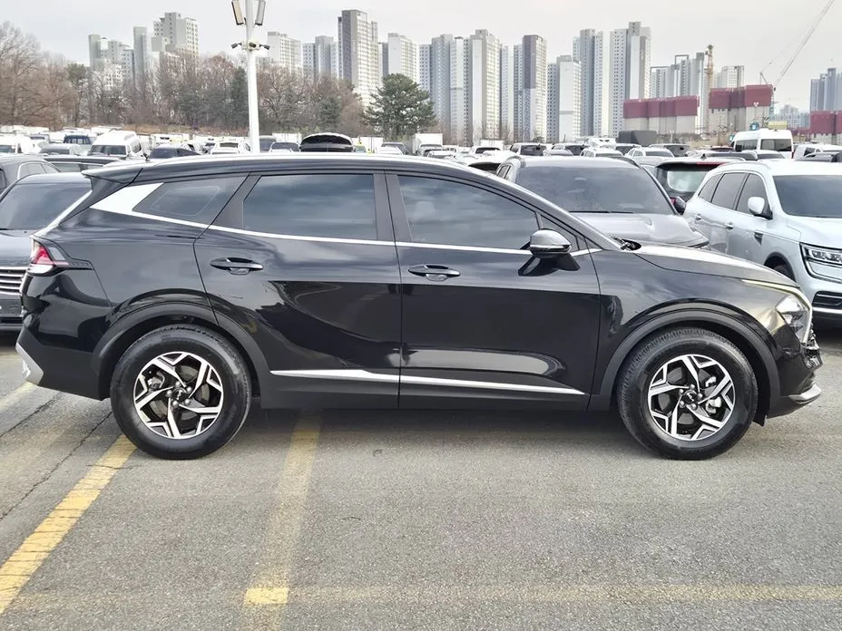 Kia Sportage — фото 9