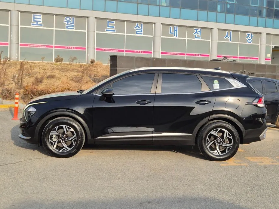 Kia Sportage — фото 7