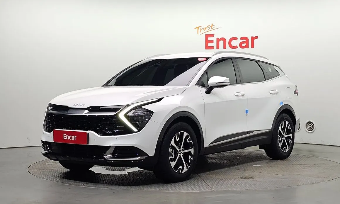 Kia Sportage — фото 1