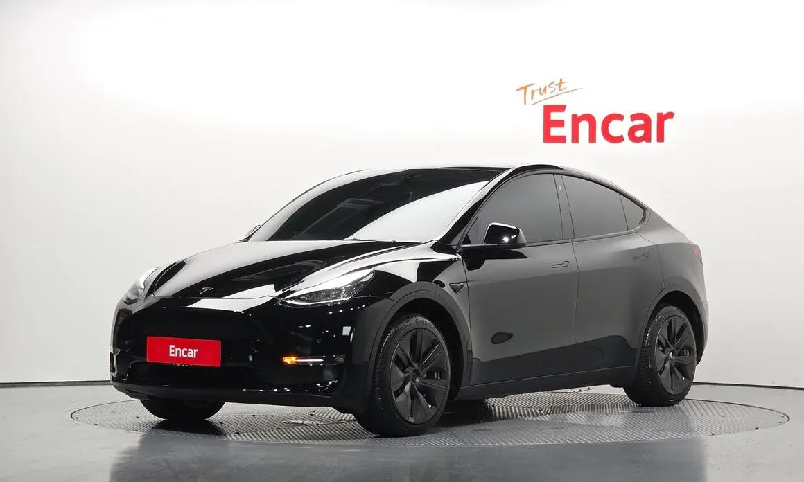 Tesla Model Y — фото 1