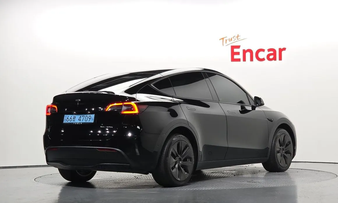 Tesla Model Y — фото 5