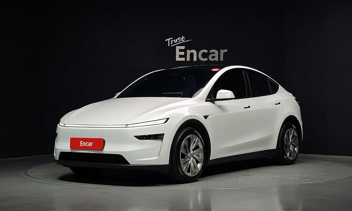 Tesla Model Y — фото 1