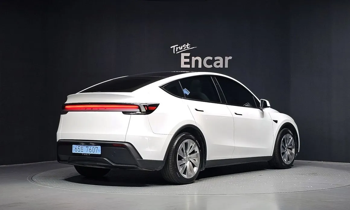 Tesla Model Y — фото 7