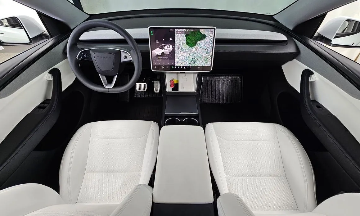 Tesla Model Y — фото 8