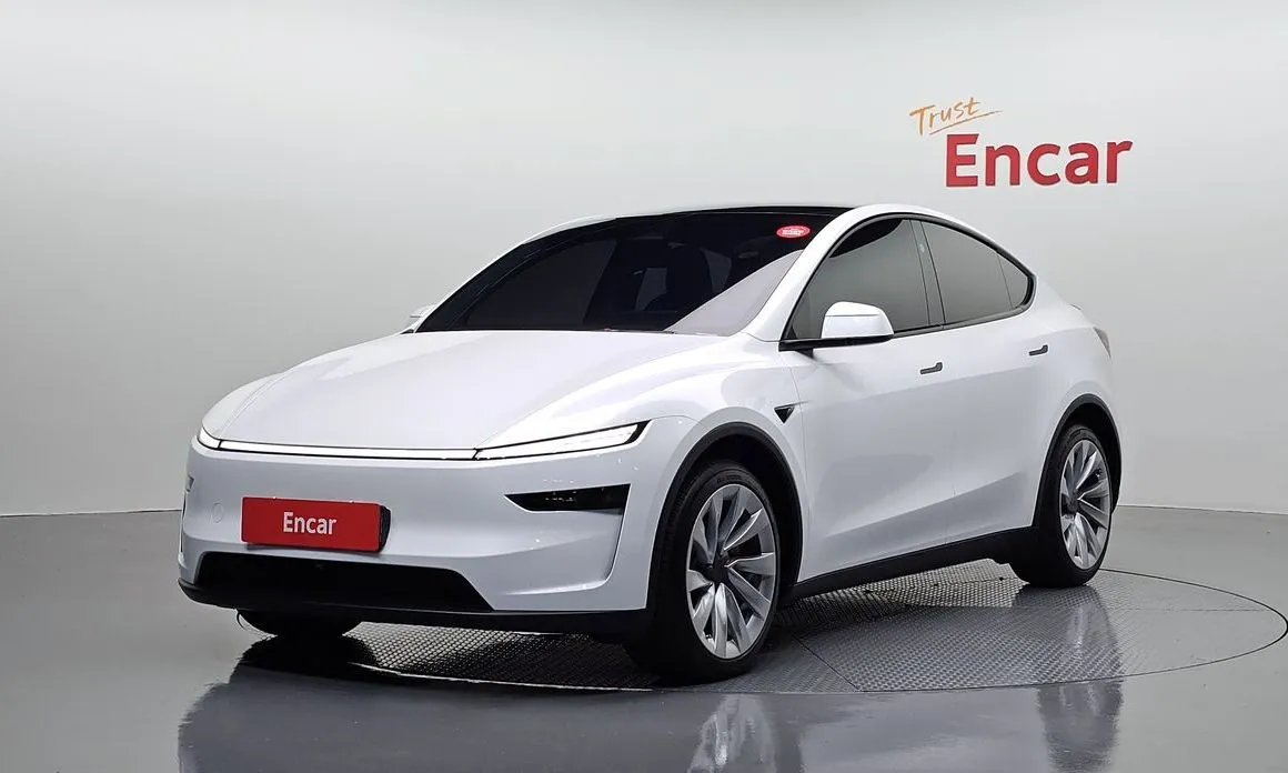 Tesla Model Y — фото 1