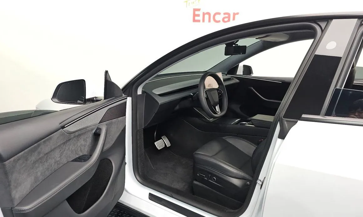 Tesla Model Y — фото 7