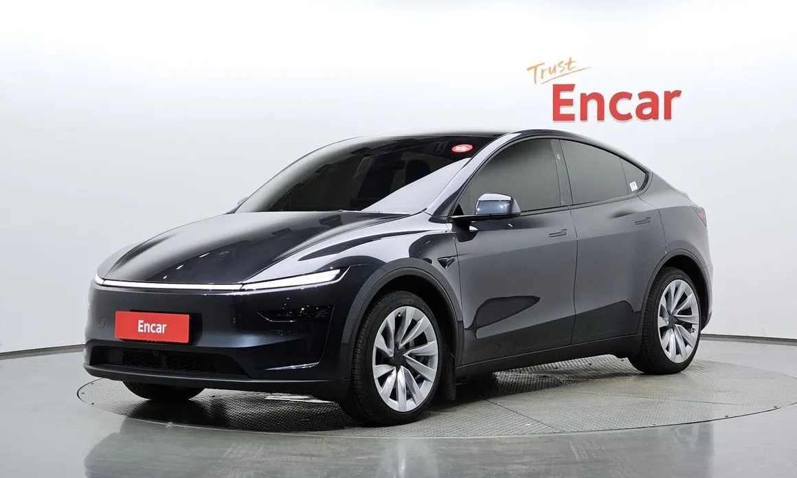 Tesla Model Y — фото 1