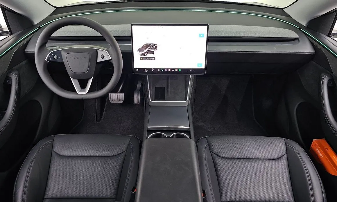 Tesla Model Y — фото 9
