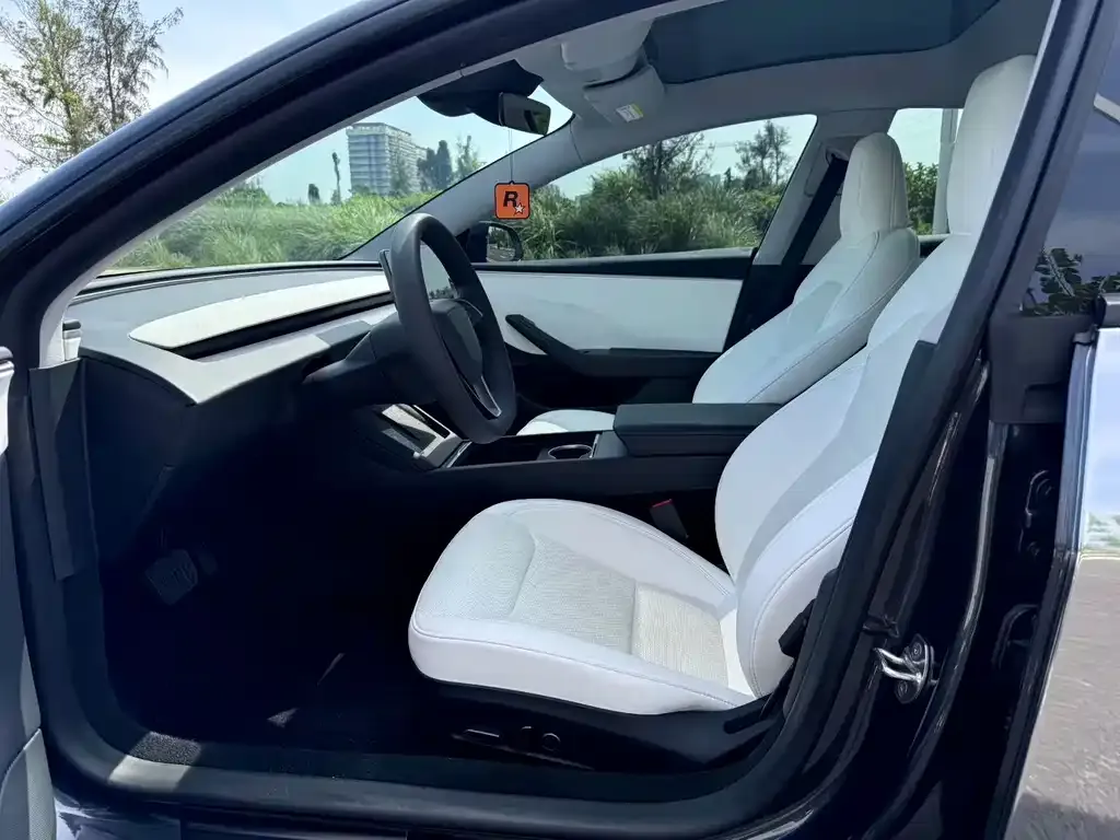 Tesla Model 3 — фото 5