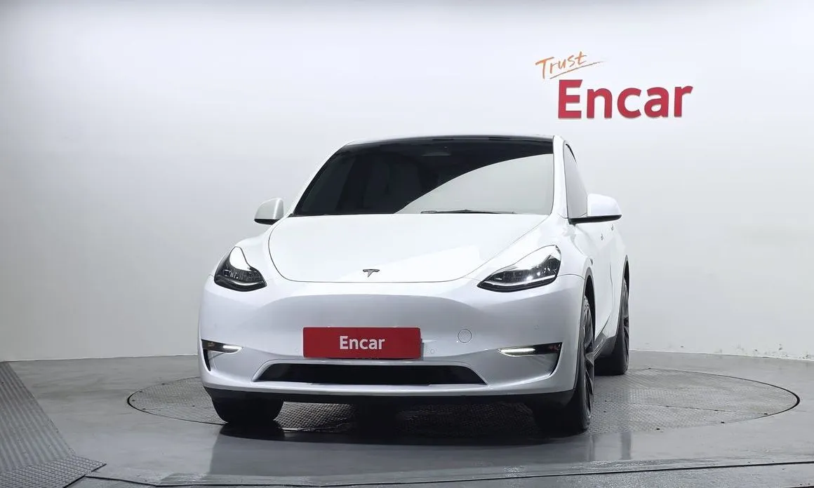 Tesla Model Y — фото 10