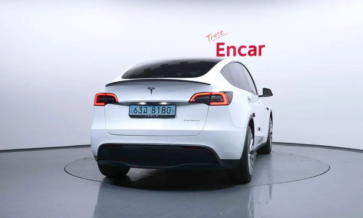 Tesla Model Y — фото 9