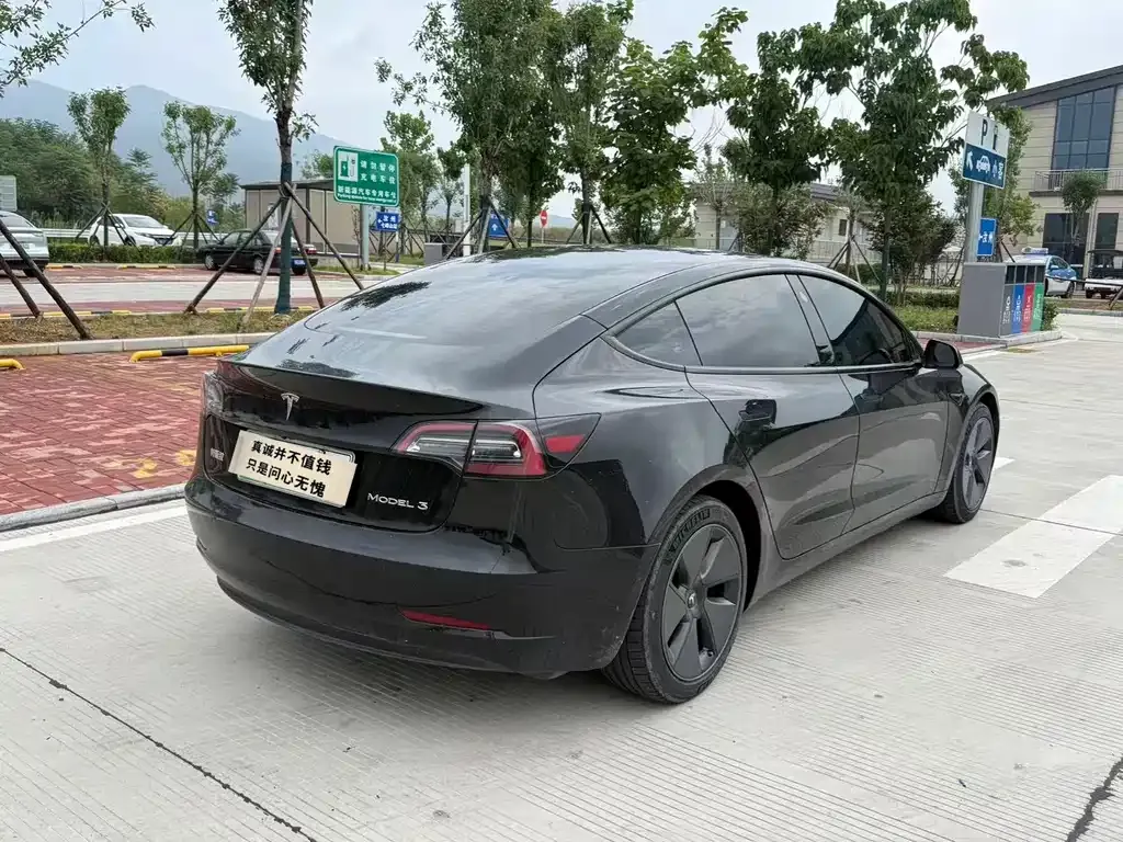 Tesla Model 3 — фото 7
