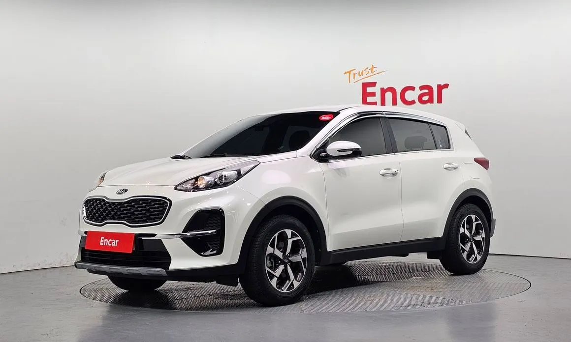 Kia Sportage — фото 1