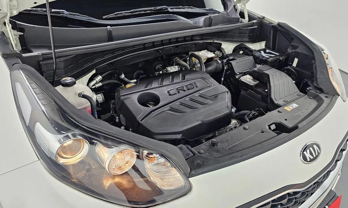Kia Sportage — фото 10