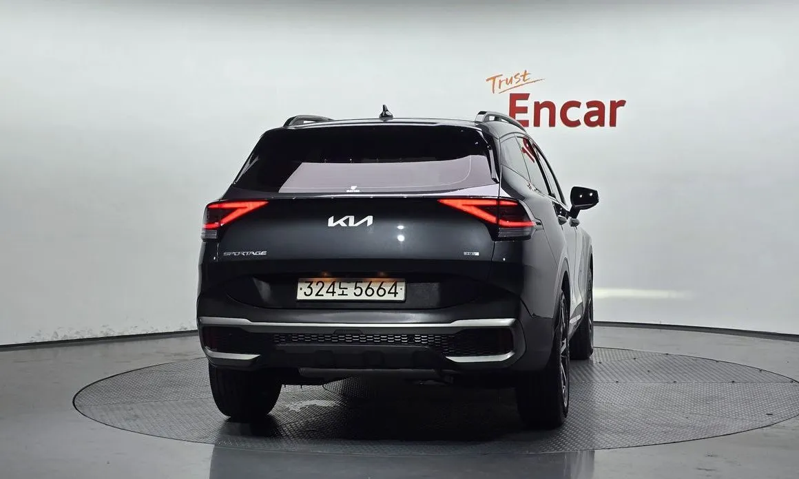 Kia Sportage — фото 10